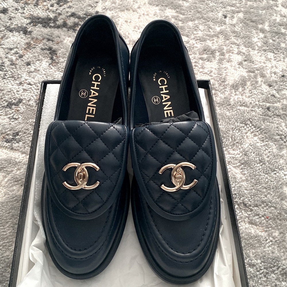 Chanel lambskin Navy Blue loafers. Brand new in box. Size 38.5. SOLD OUT!!